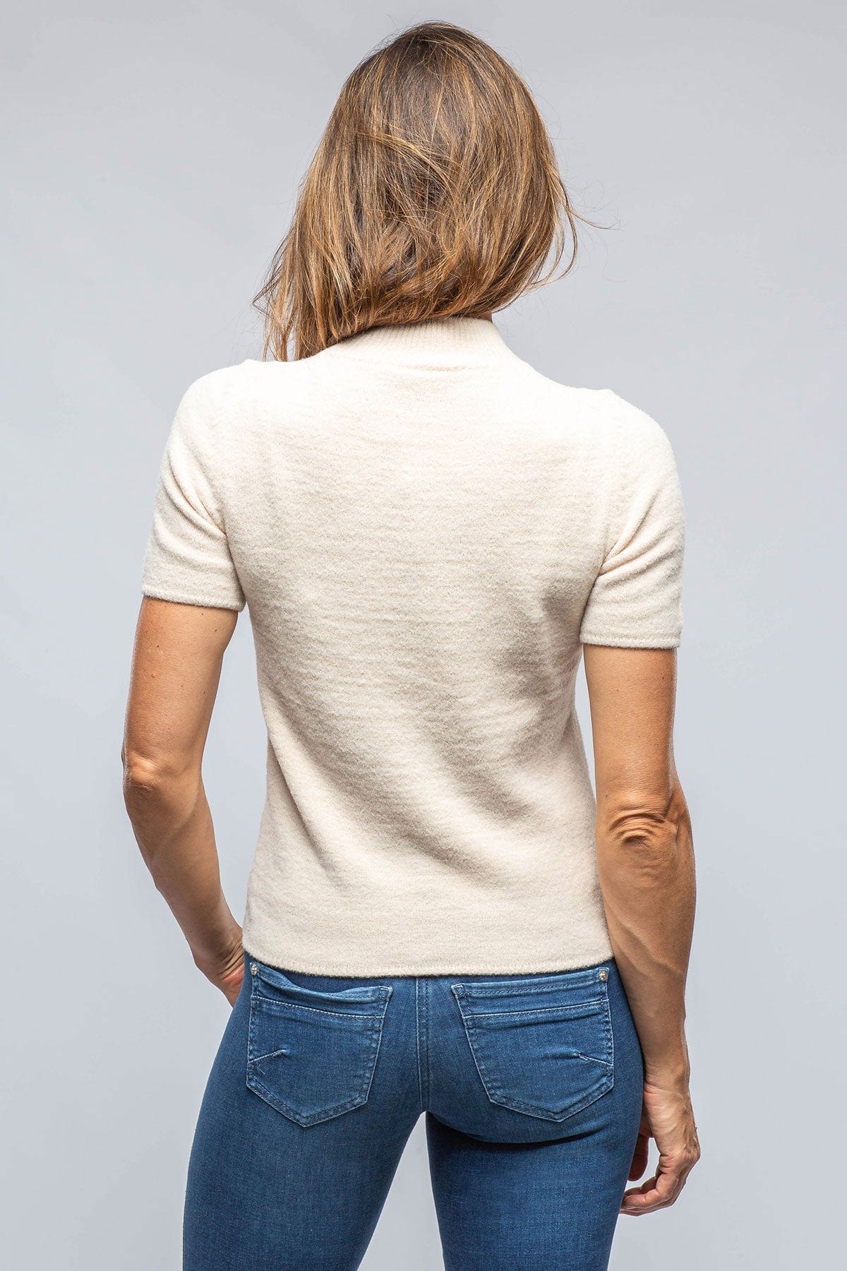 beige mock neck top